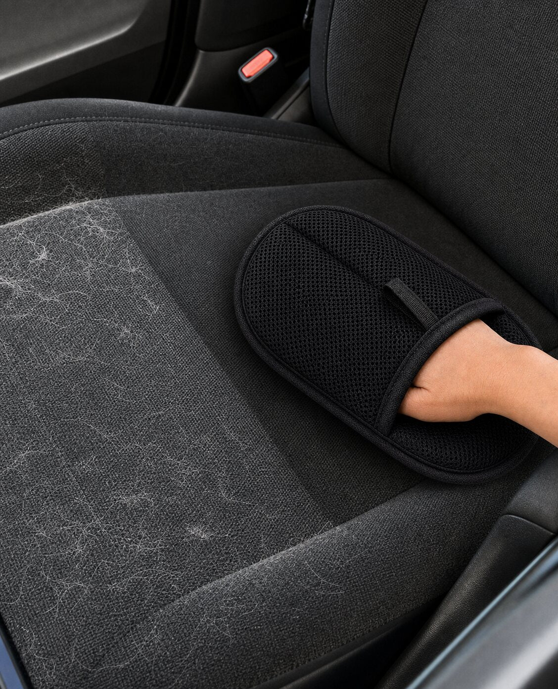 FurEraser cleaning pet hair from a car seat